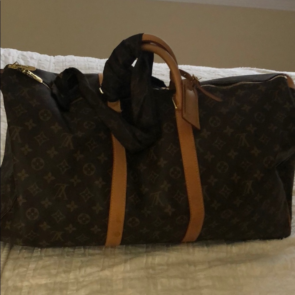 Authentic keepall 55 weekend Louis Vuitton Duffle